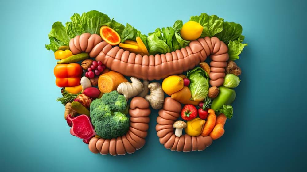 A creative representation of the intestines made of various colorful fruits and vegetables, symbolizing healthy digestion and nutrition.